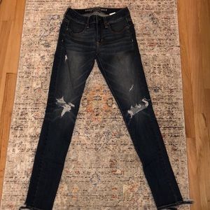 American Eagle high rise ripped straight leg jeans